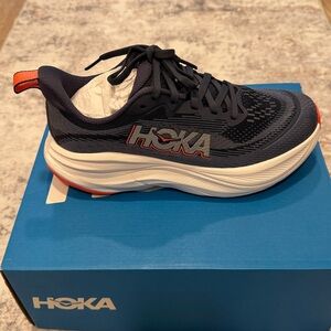 Hoka Navy, White and Orange Women’s Cushioned Running Shoe